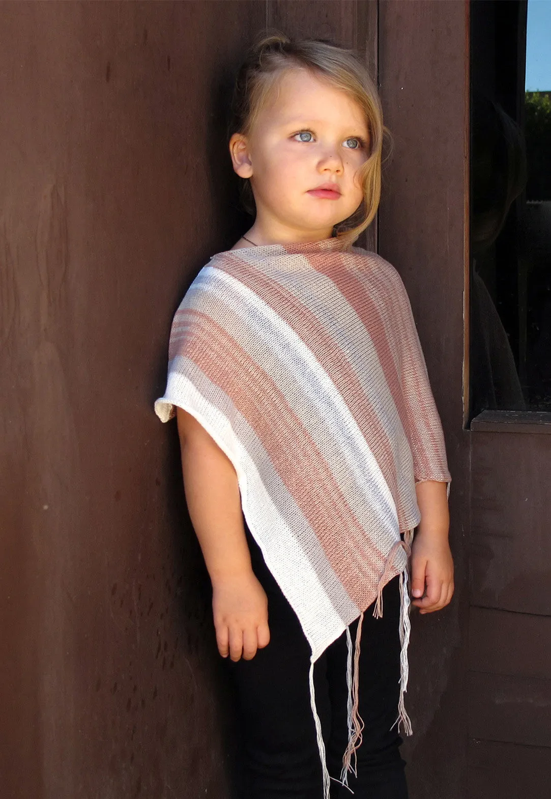 Lil Goddis Poncho in Rosebud